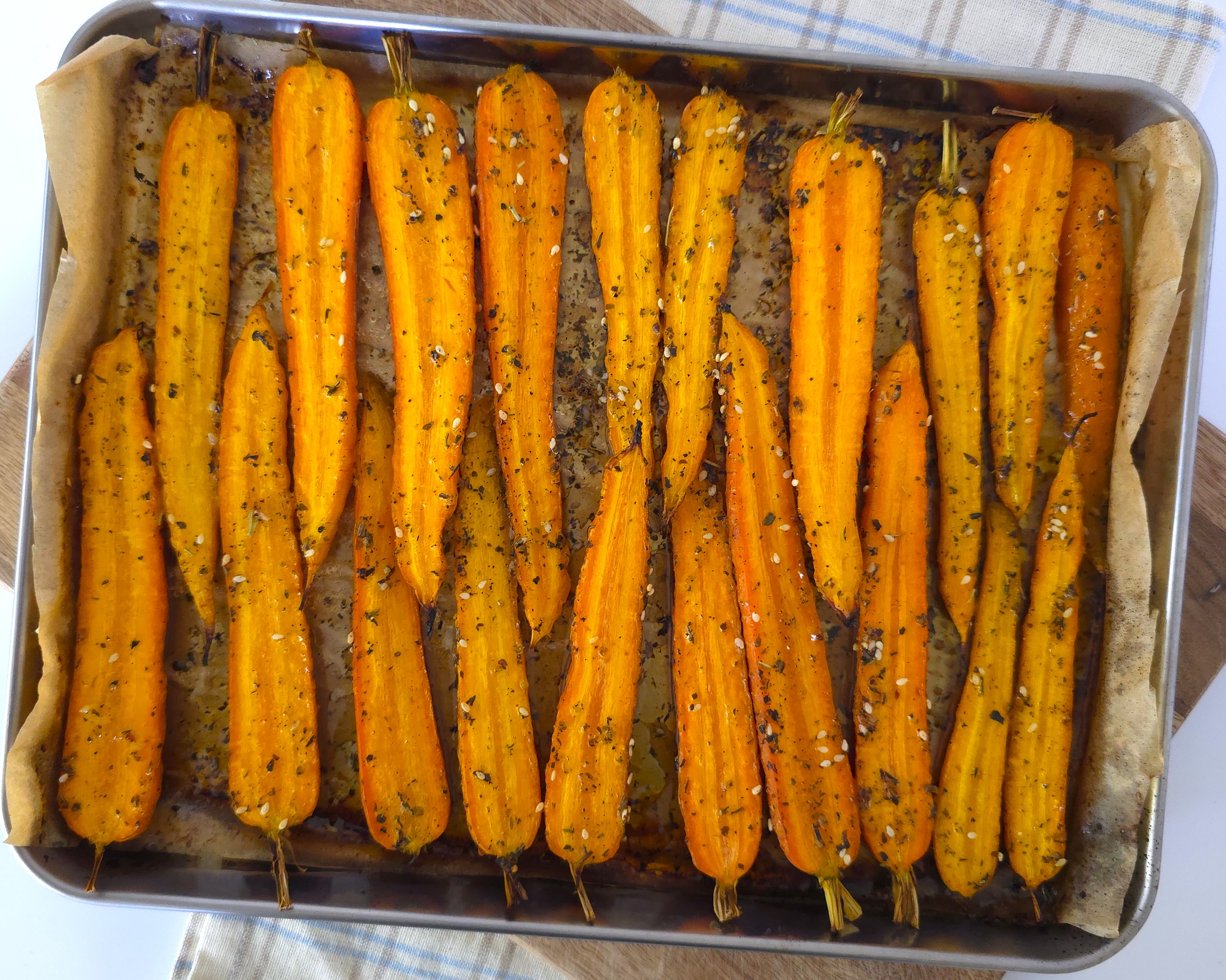 roasted maple carrots in a baking tray