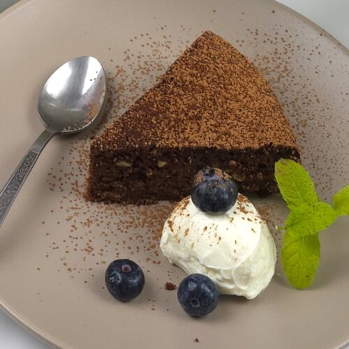 a close look to a plate with caprese cake