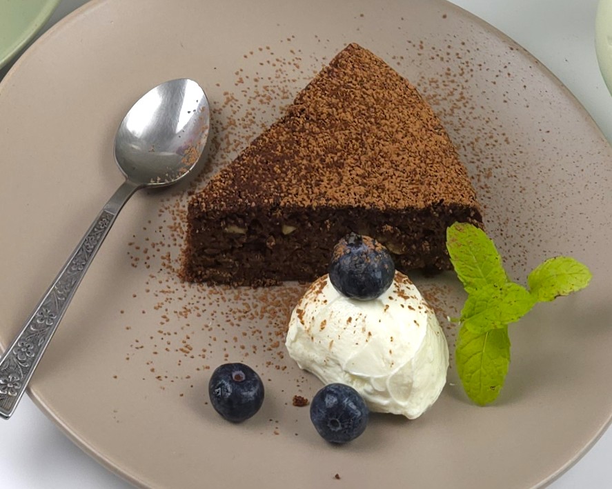 a close look to a plate with caprese cake