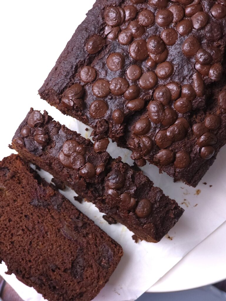 gluten free chocolate banana bread with ghee sliced on cooling rack