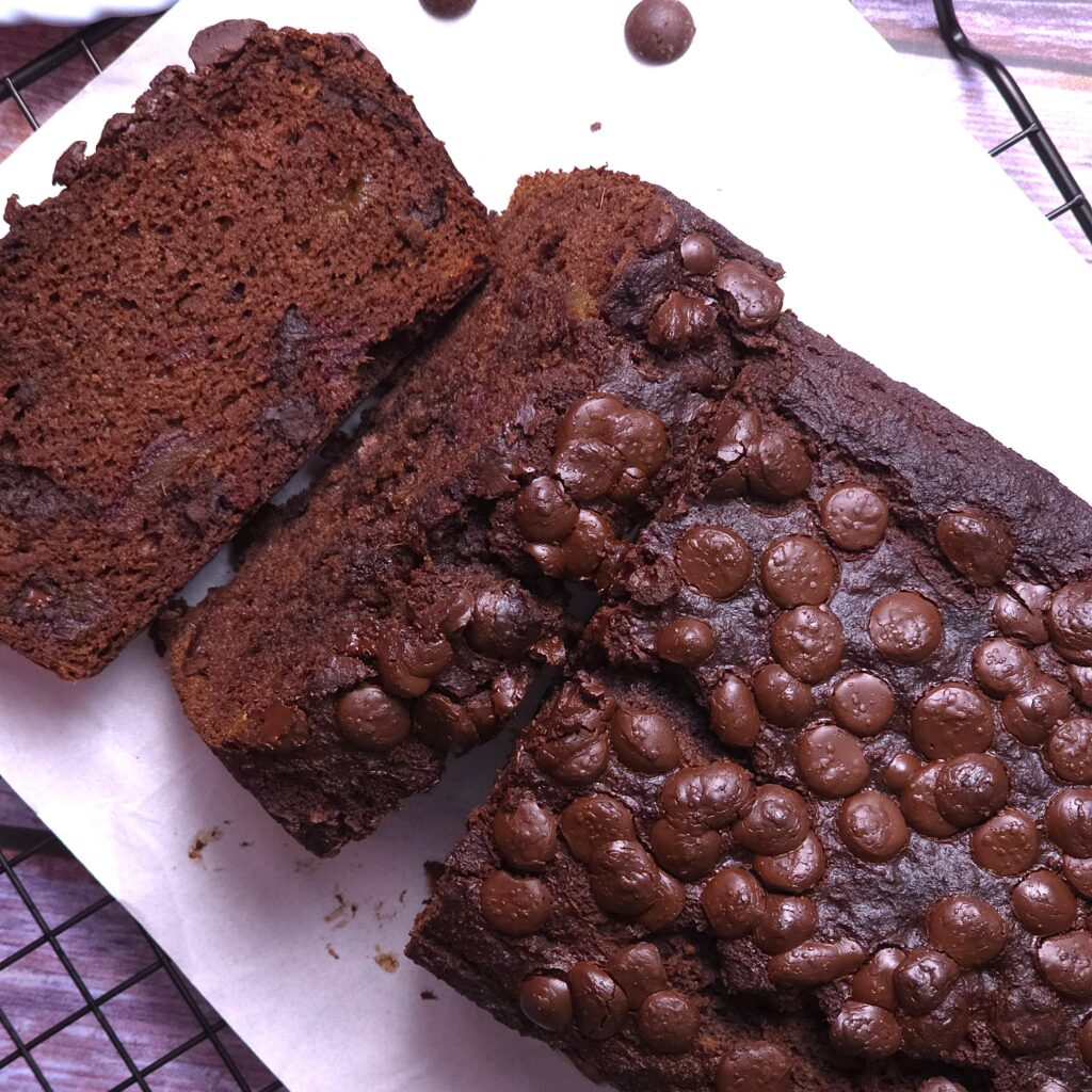 sliced gluten-free almond flour banana bread on a wire rack