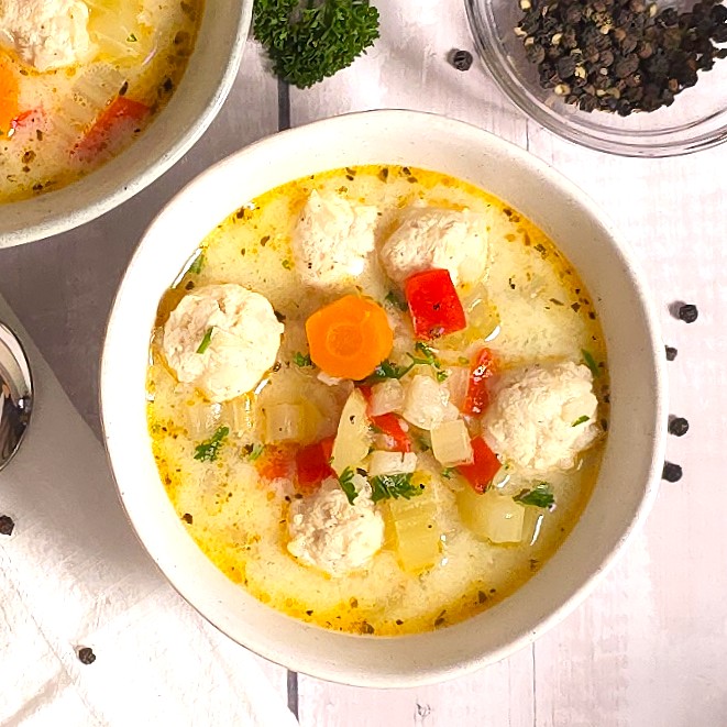turkey meatball soup in a white stoneware bowl