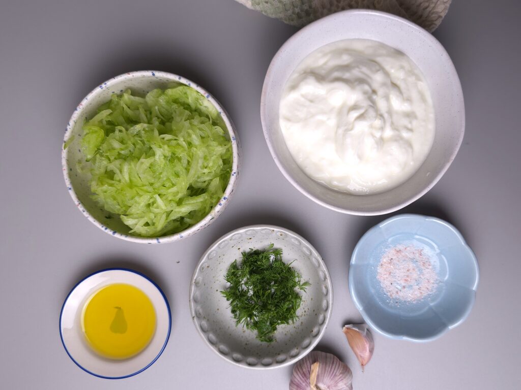 Greek tzatziki recipe ingredients in bowls