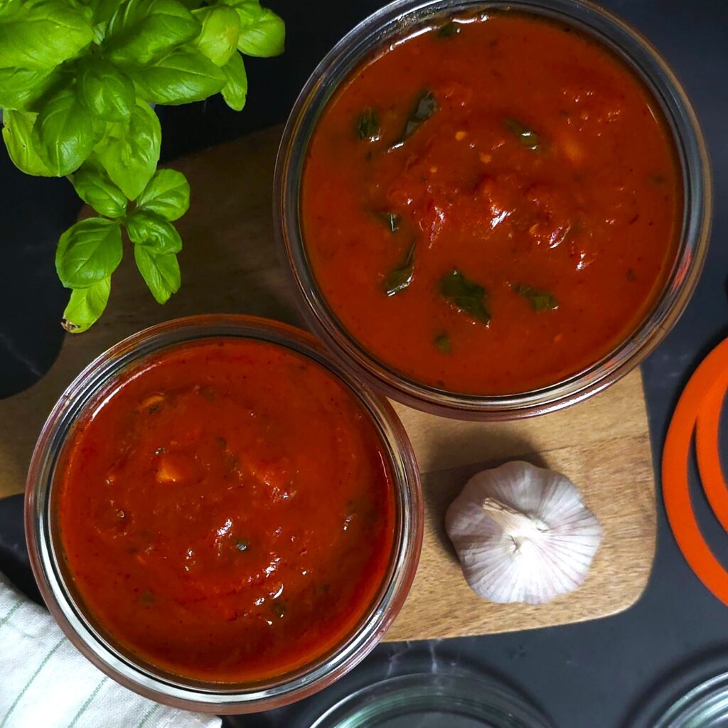 two jars with a homemade Italian tomato sauce
