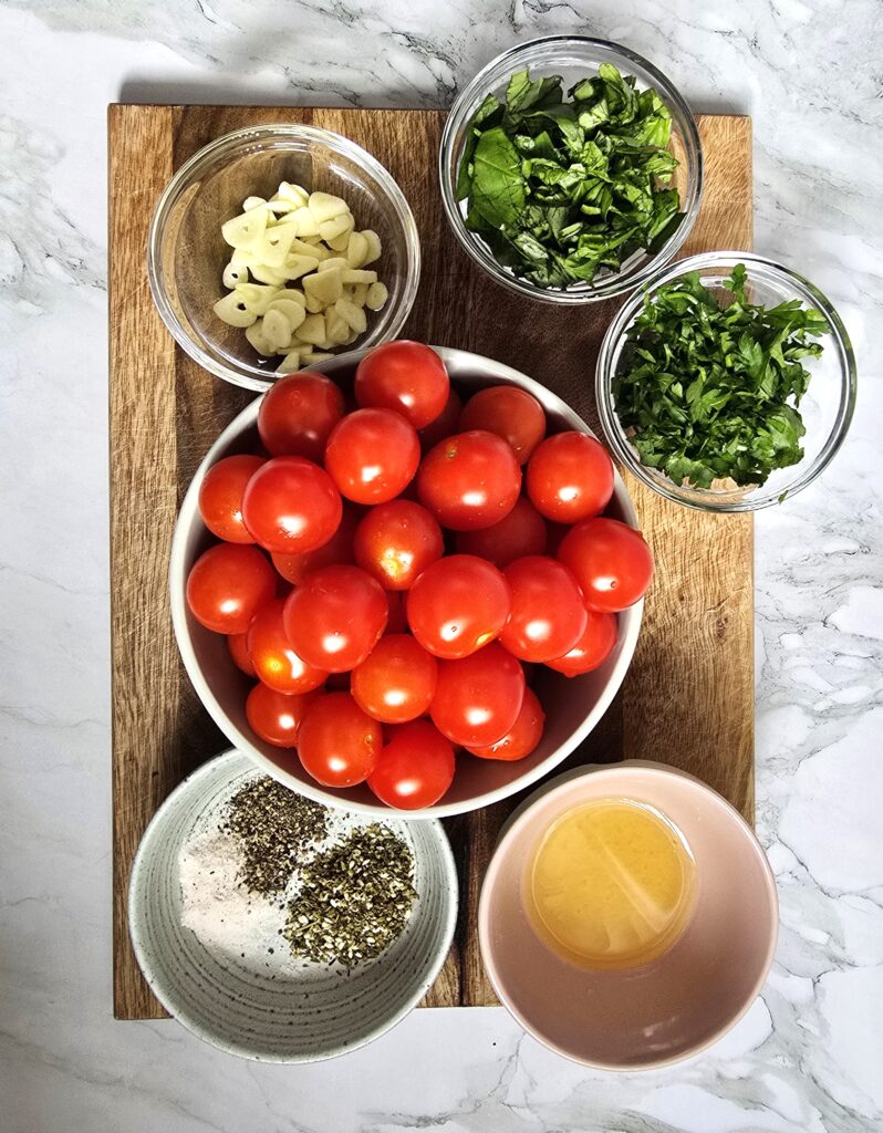 marinara sauce ingredients - fresh tomatoes, garlic, olive oil, fresh basil, herbs and spices