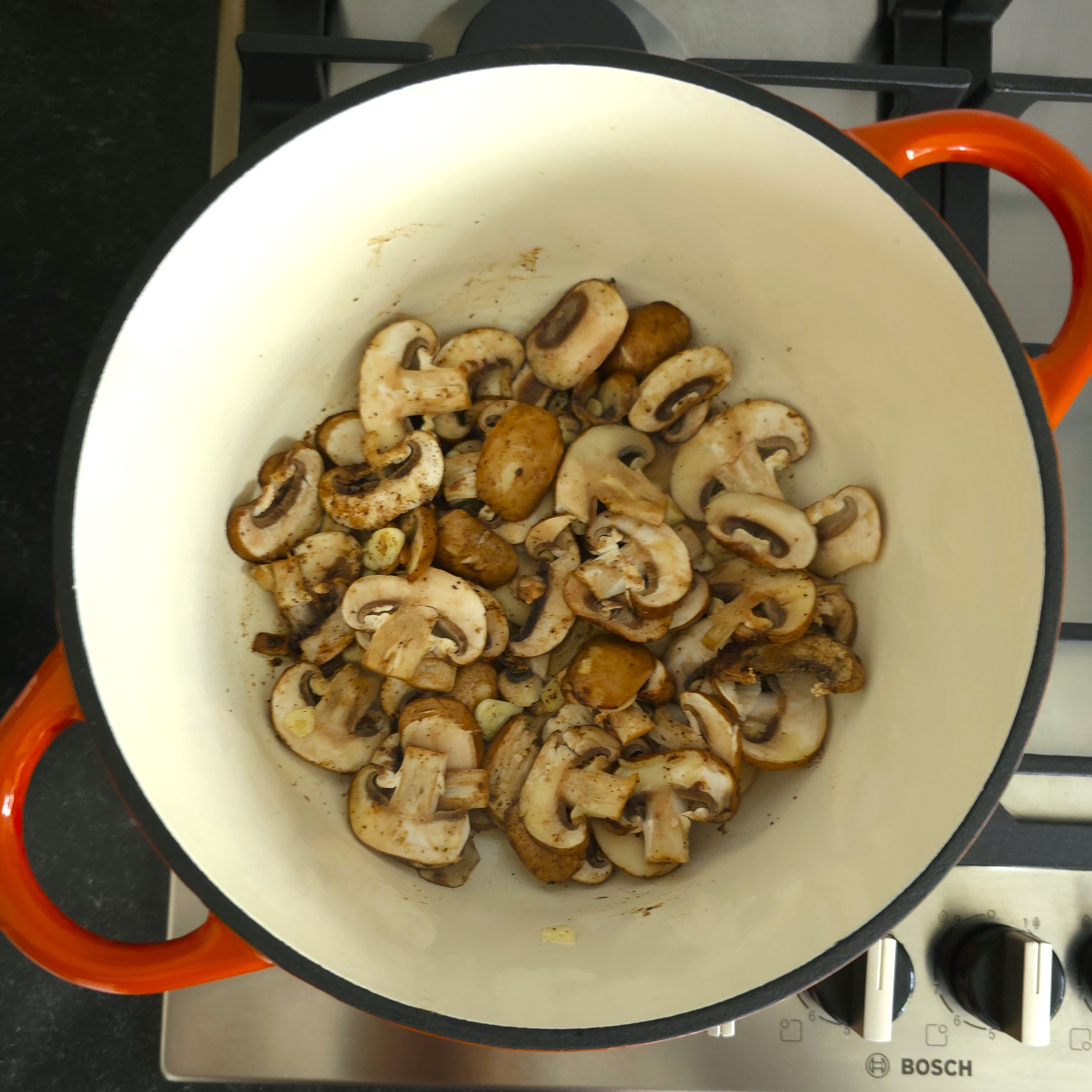 sauteing the vegetables ans spices in a pot