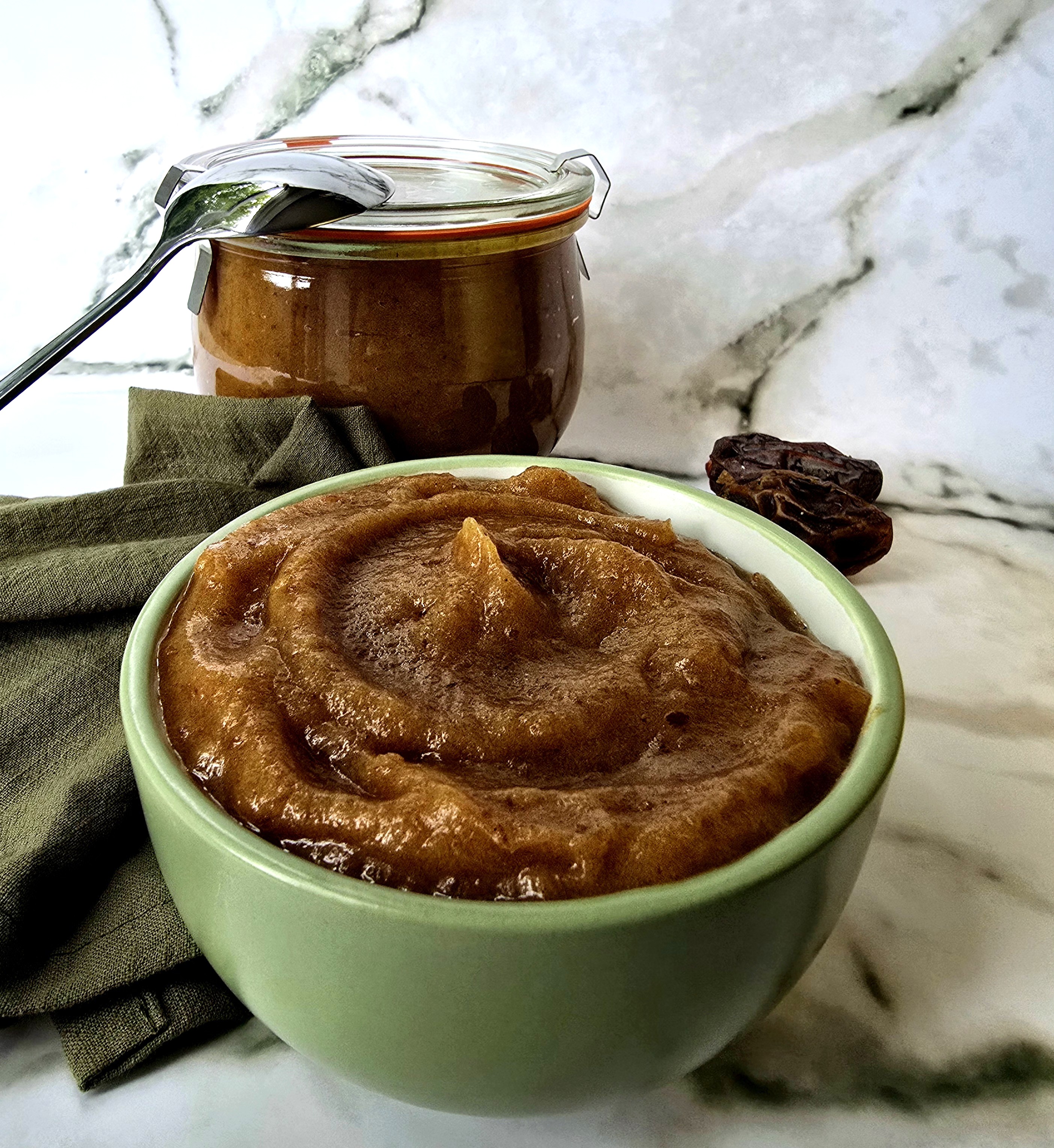 a bowl with date paste