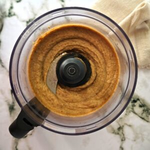 already blended dates in a food processor container