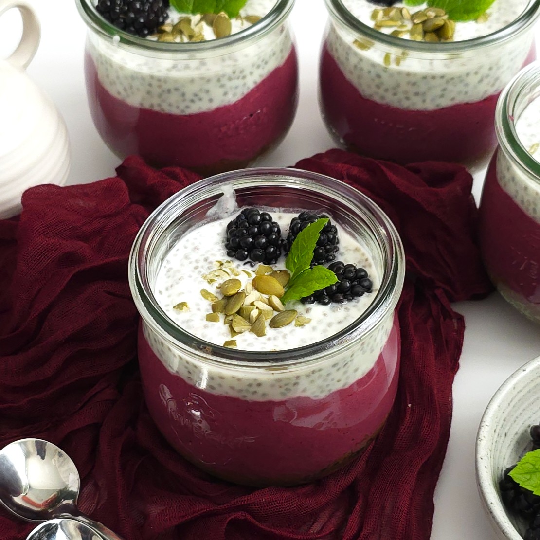Blackberry yoghurt chia parfait in a jar