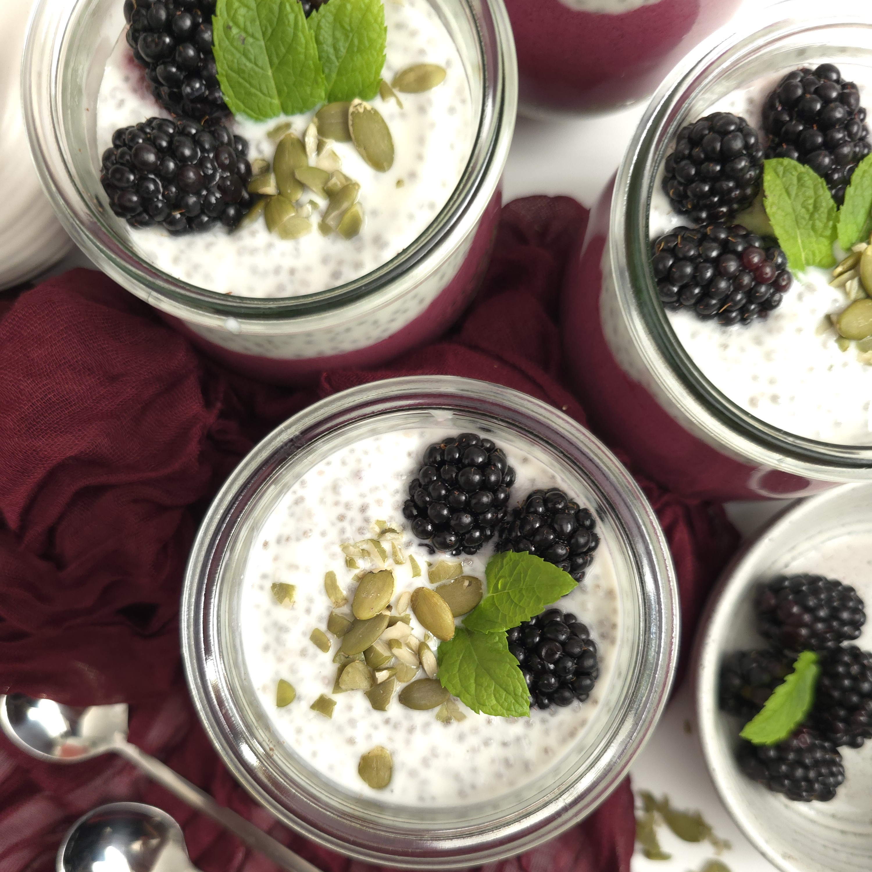 blackberry chia parfait in jars top view