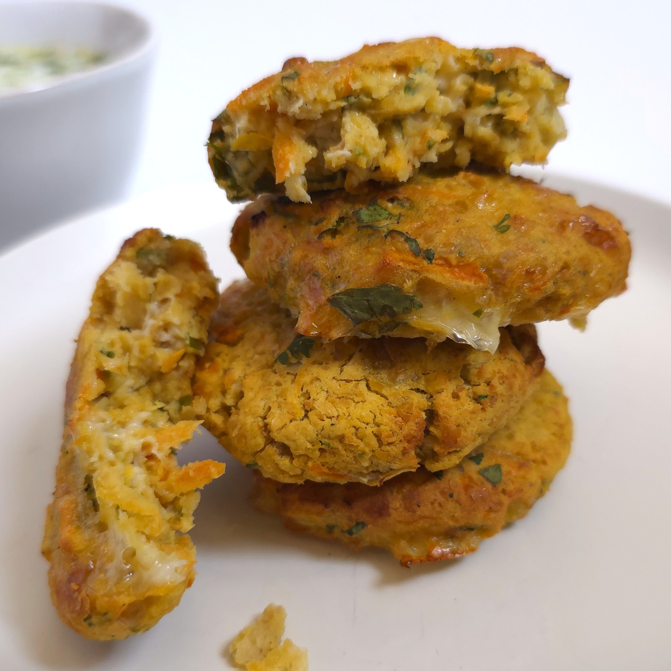 close look chickpea patties in a white plate