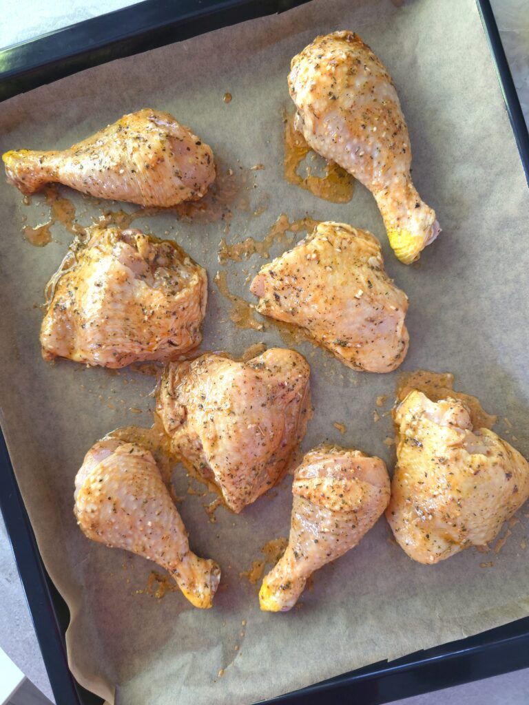 marinated chicken in a baking tray