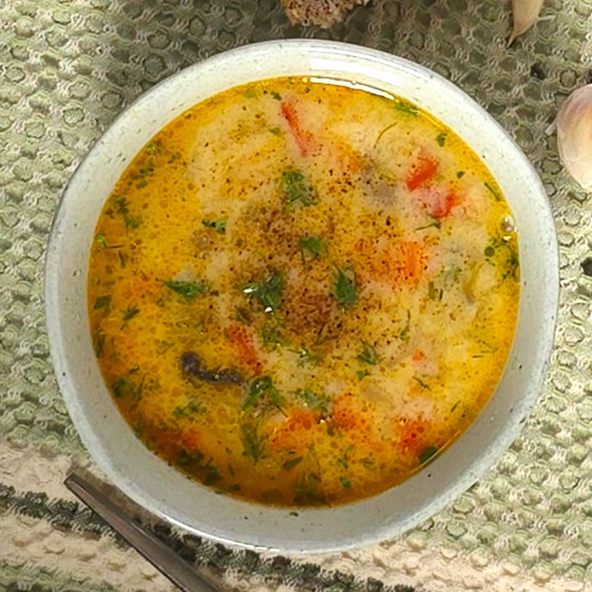 vegetable soup in a stoneware bowl
