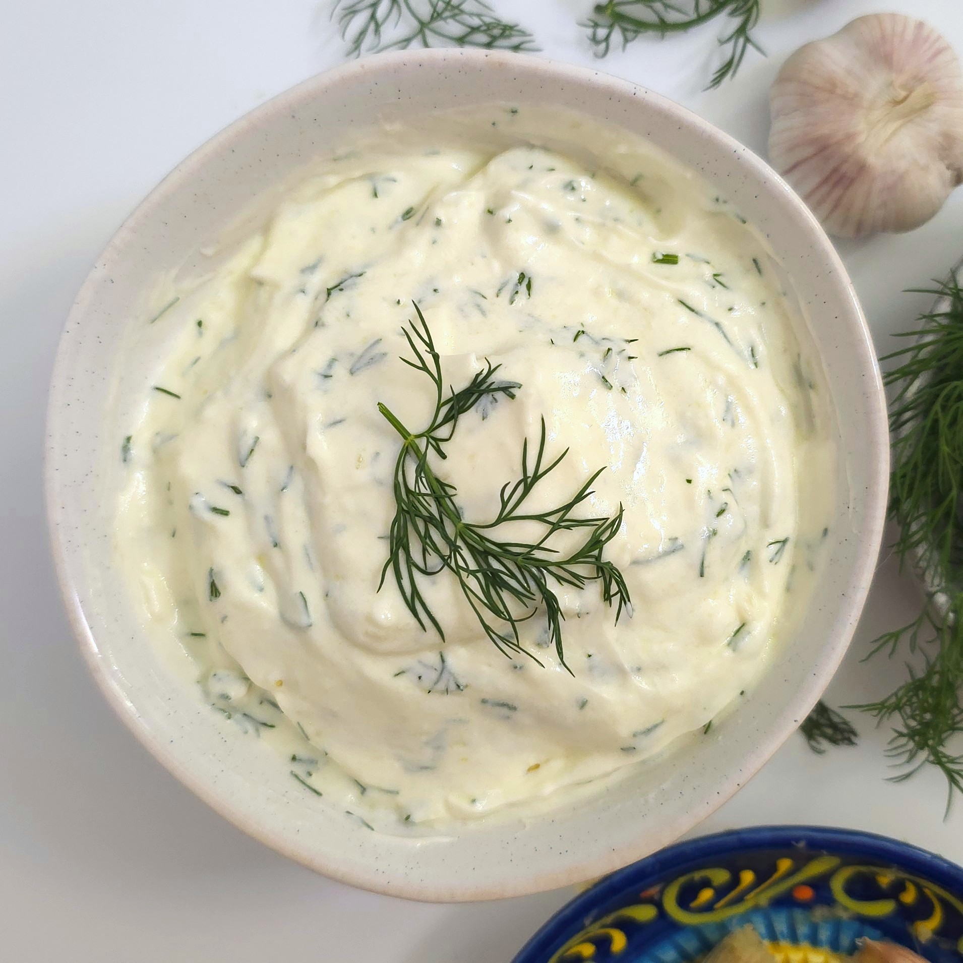 yoghurt garlic sauce in a white bowl