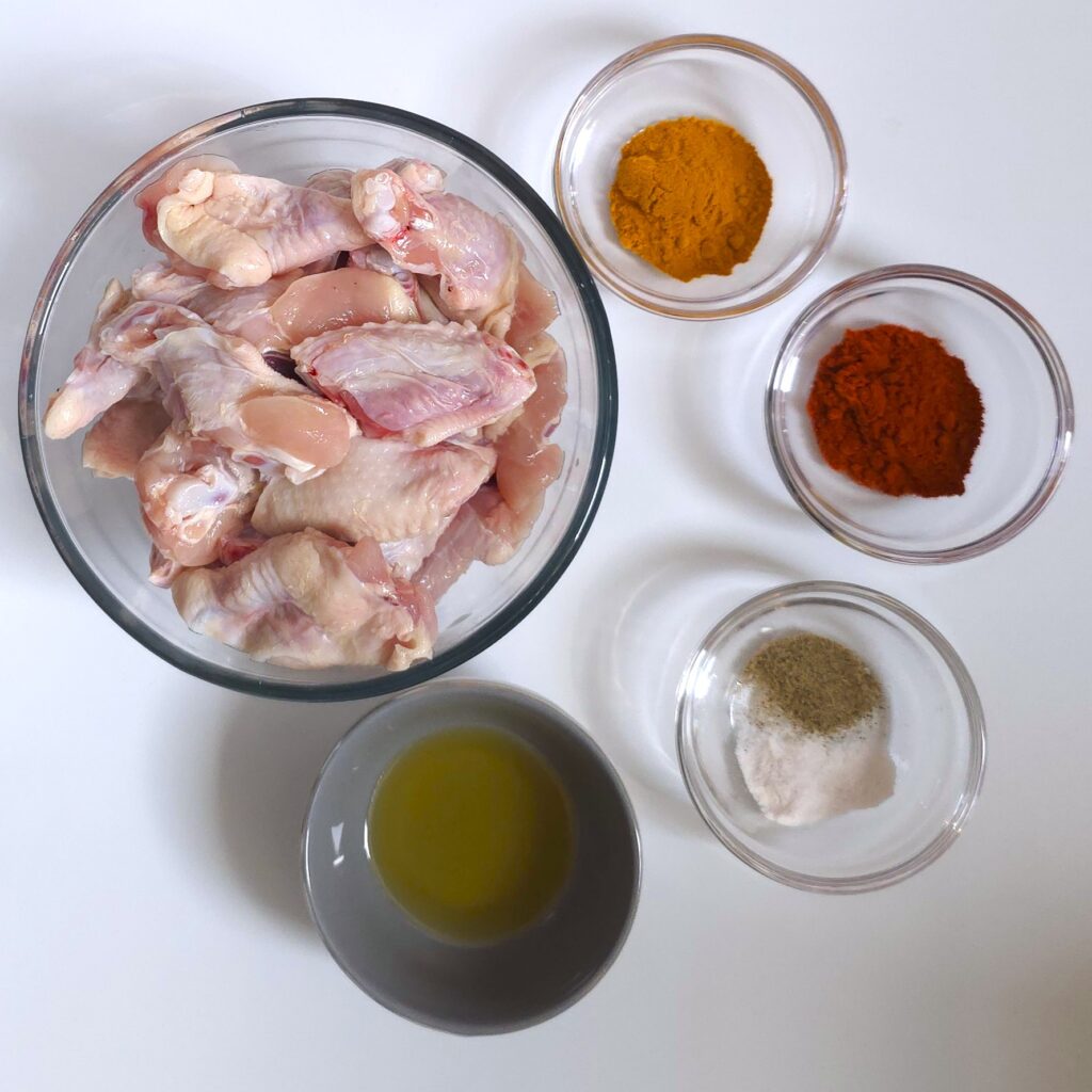 oven-baked chicken wings ingredients in bowls