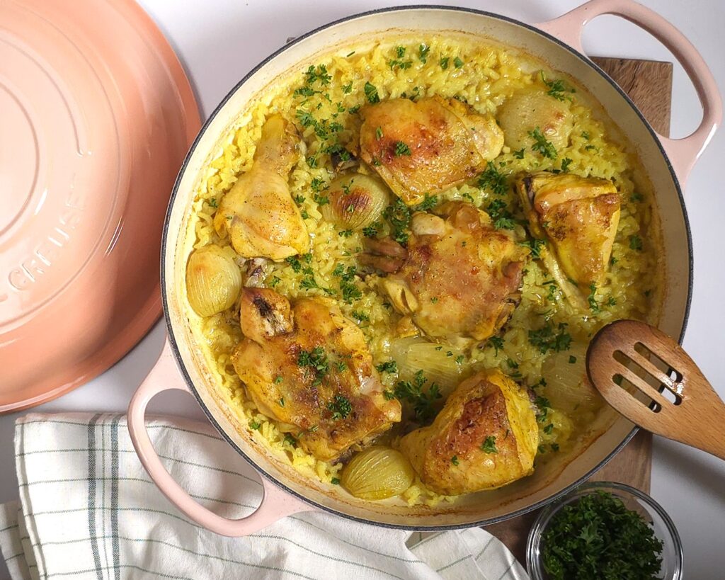one pan chicken with rice in a large le creuset skillet