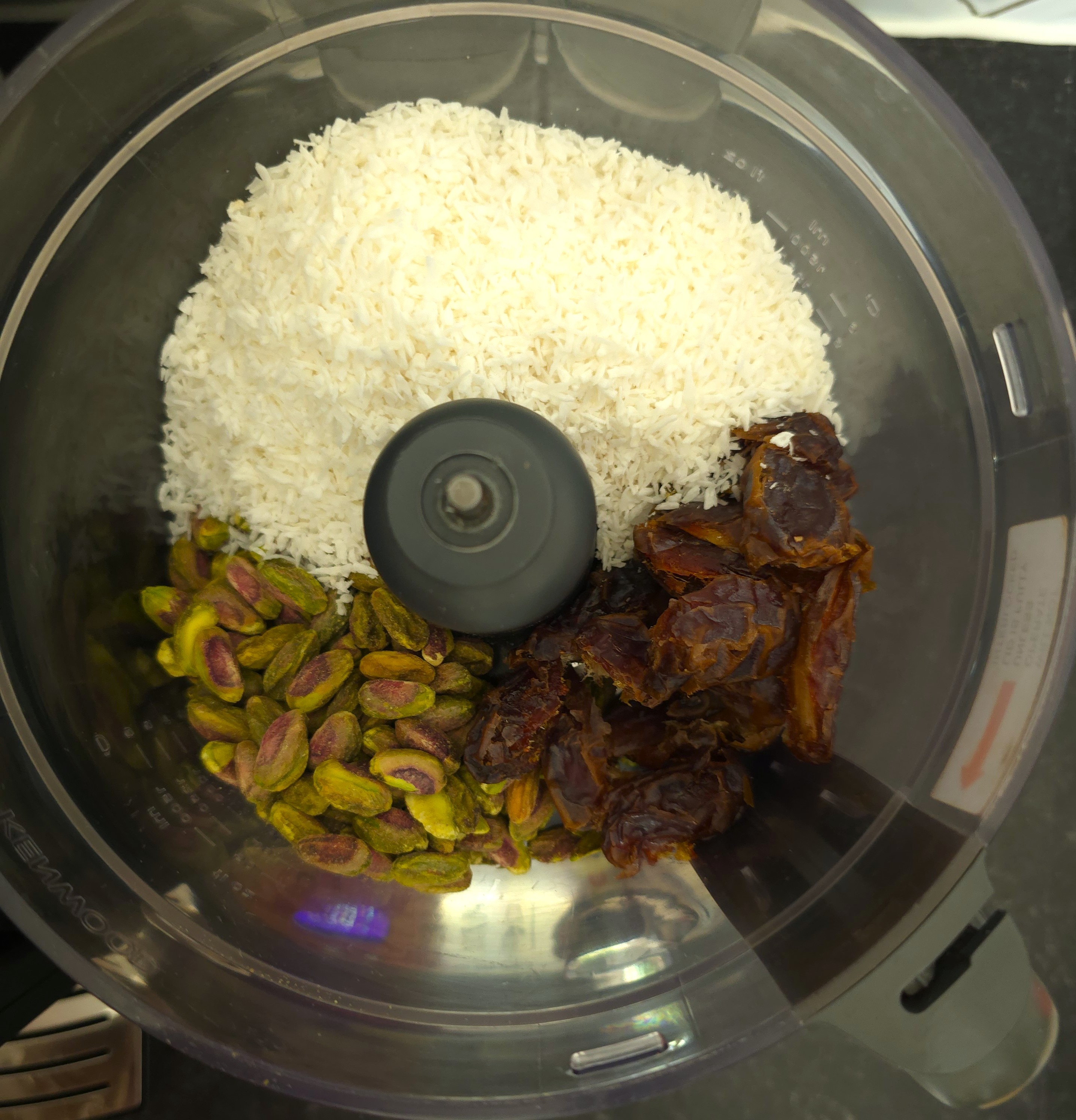 pistachio, dates and desiccated coconut in a food processor