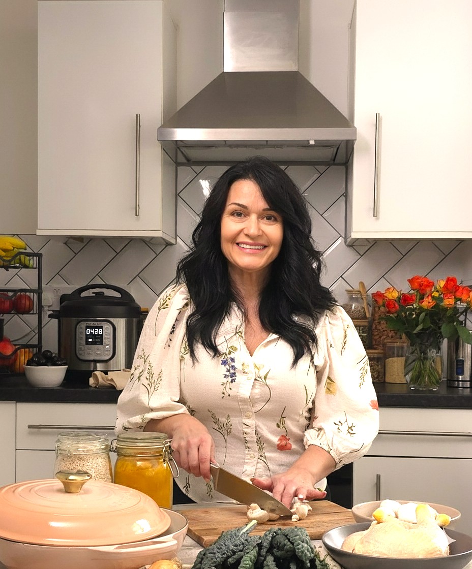 Dani, gluten-free food blogger and founder of DeGlutenista, in her kitchen