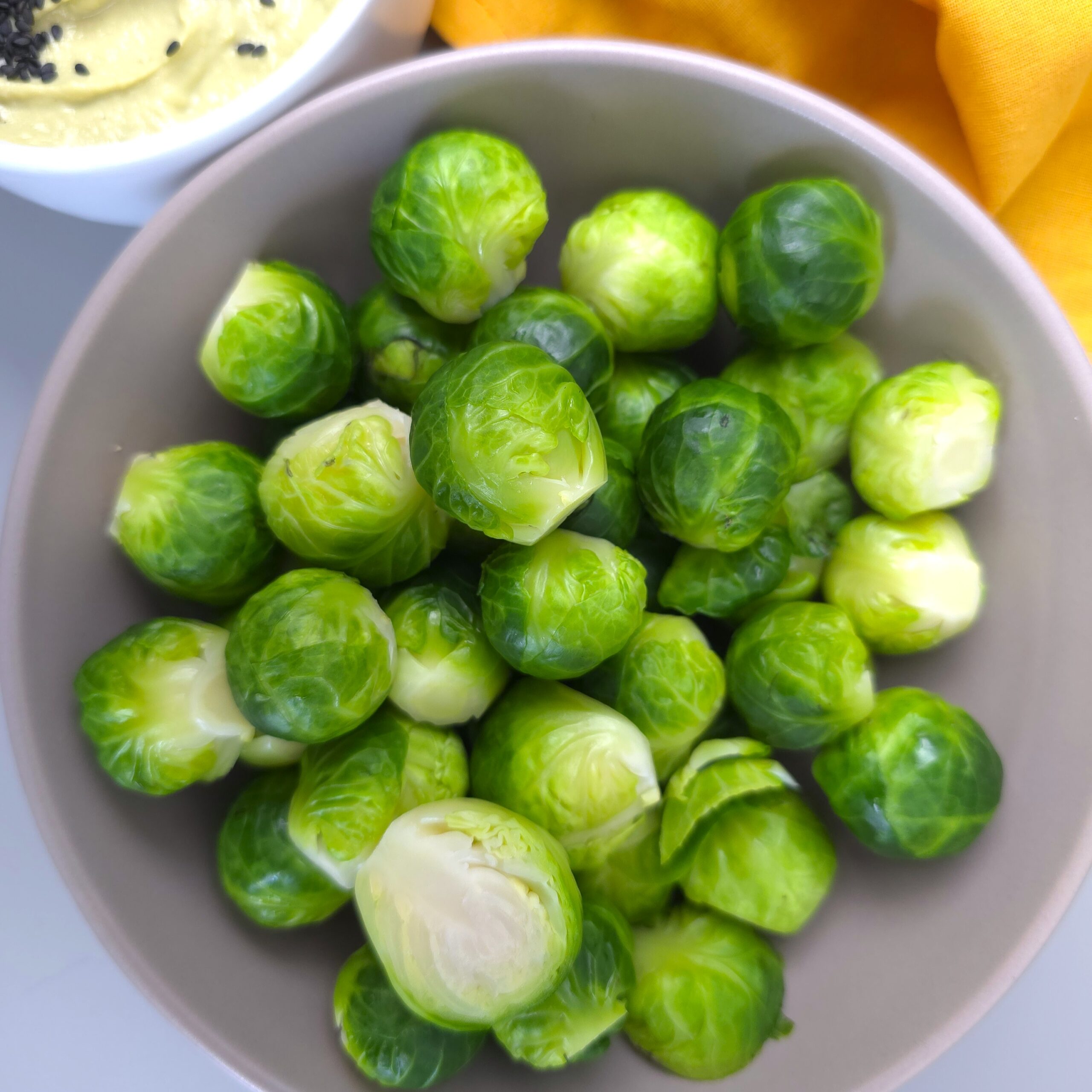 a bowl with steamed brussels sprouts recipe