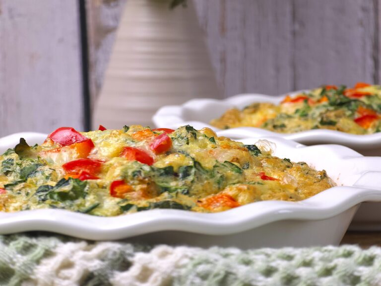 a close look of baked mini quiche in a white ceramic baking dish