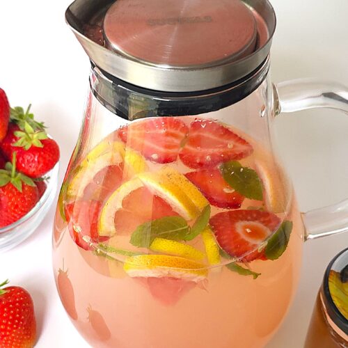 a jug with citrus mint electrolyte drink