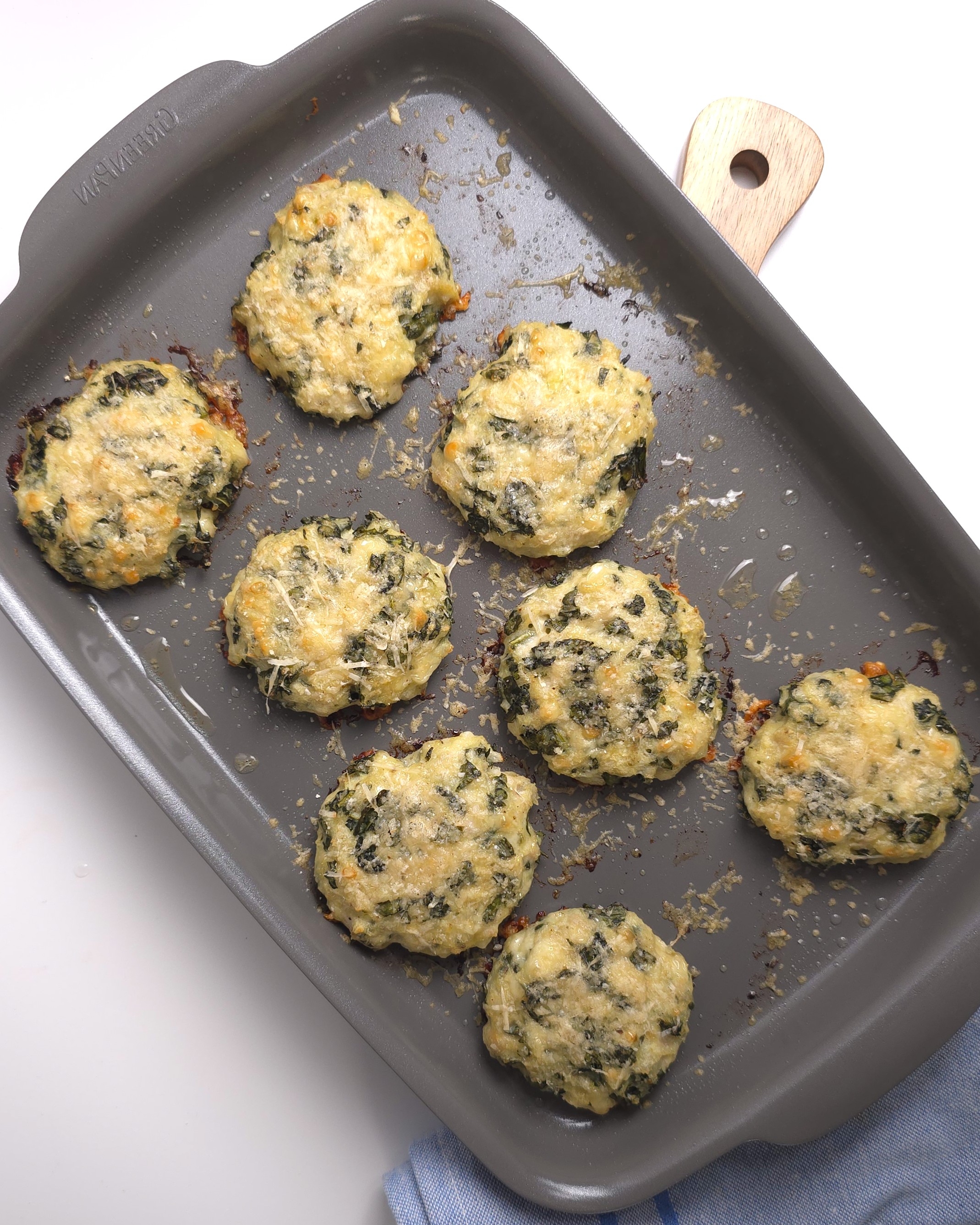 the baked kale burgers in a roasting tray