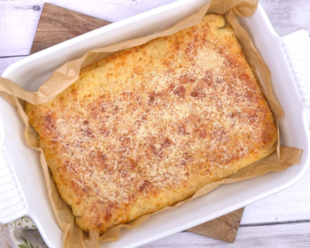 a gluten-free frittata in a white ceramic baking dish
