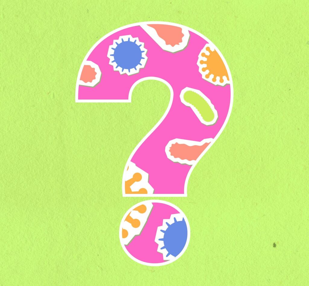 Overhead view of cardboard applique representing interrogative symbol with bacilli and infectious agents on green background