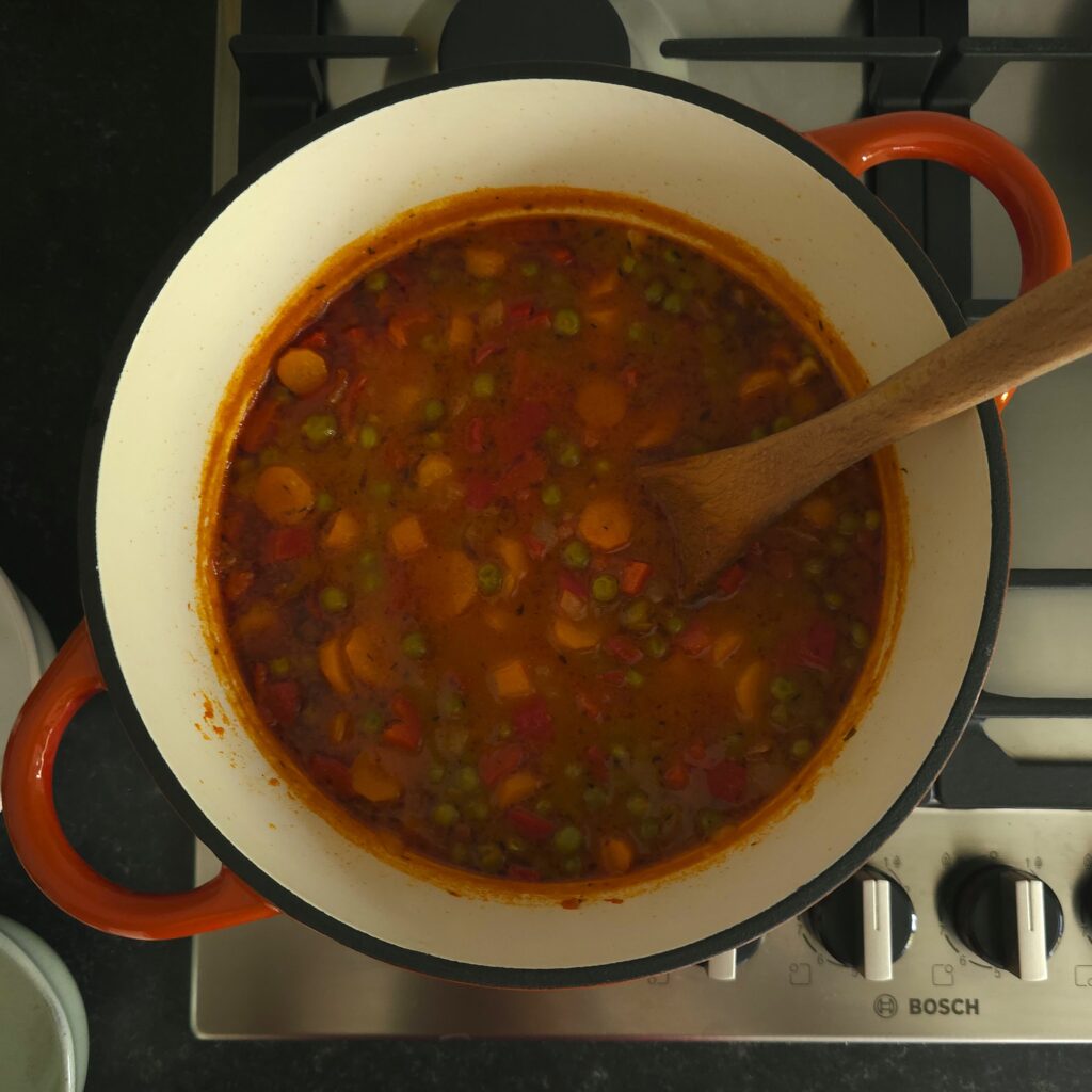 pea stew step three in a cast-iron pot