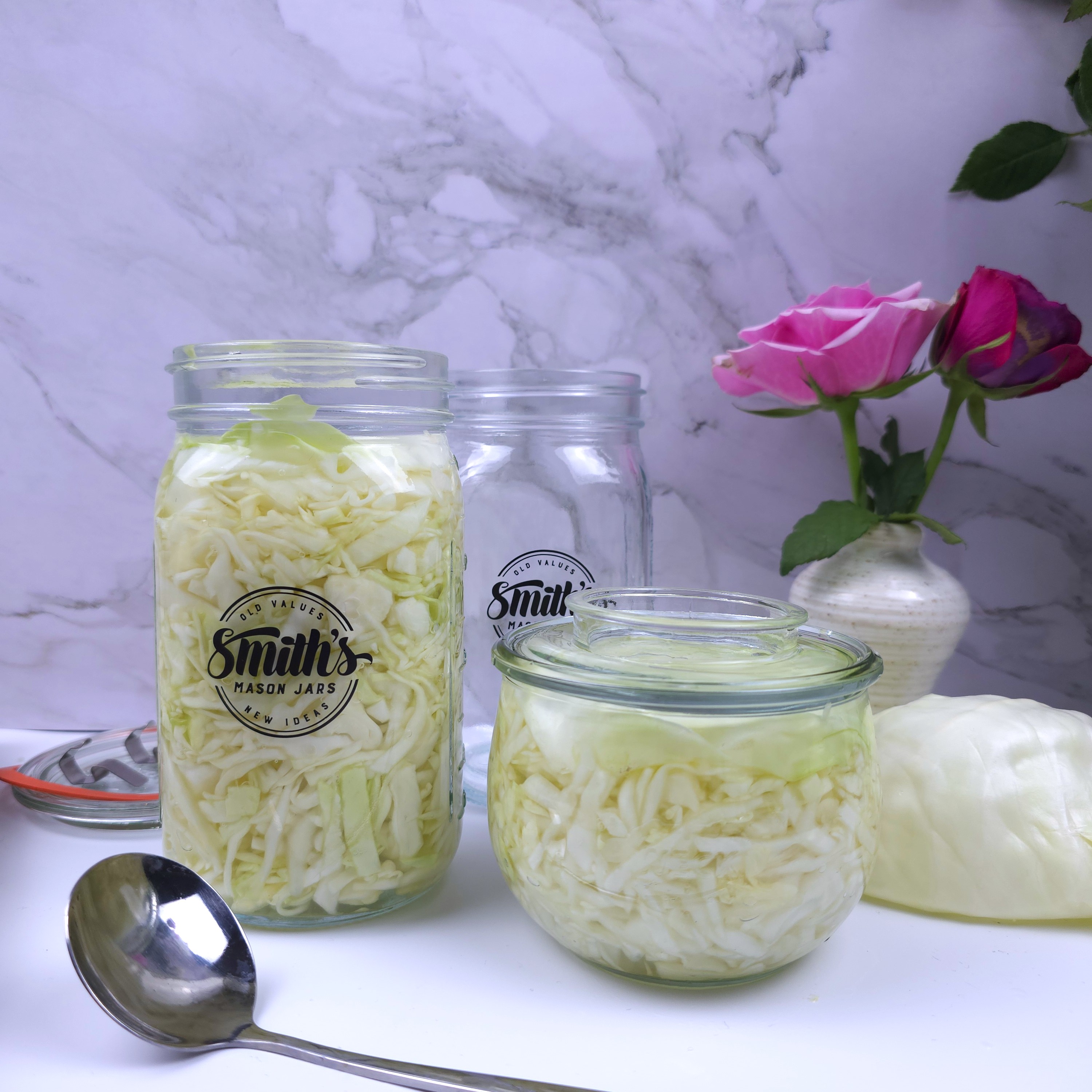 sauerkraut from white cabbage in jars ready for fermentation