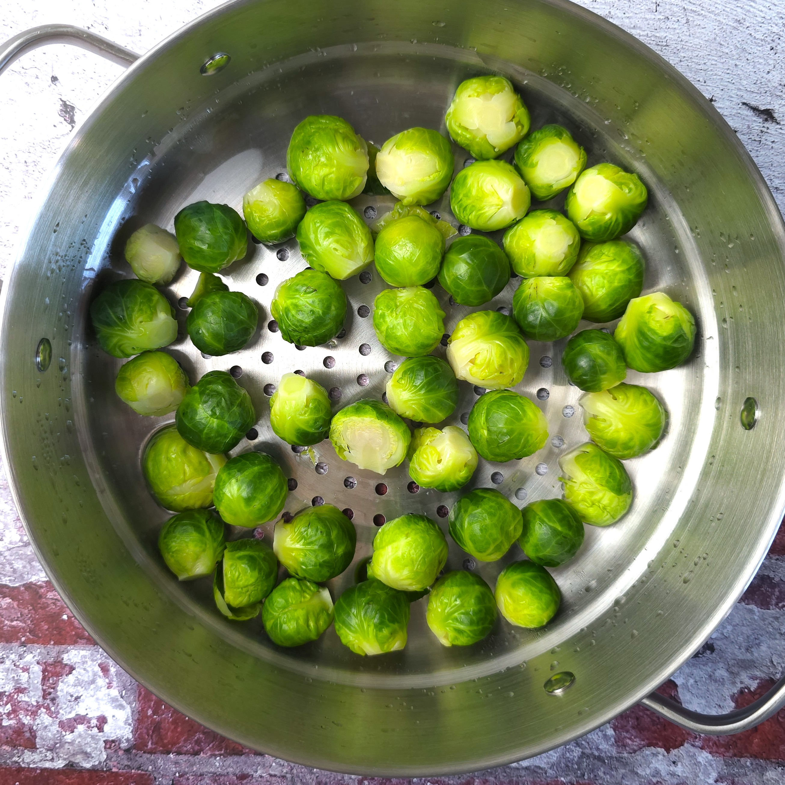 brussels sprouts in a steaming basket