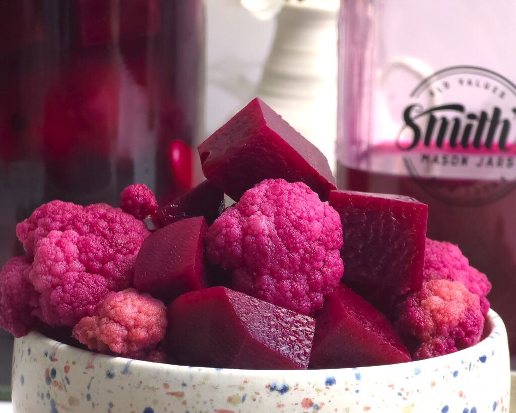 a close look of fermented beetroot and cauliflower