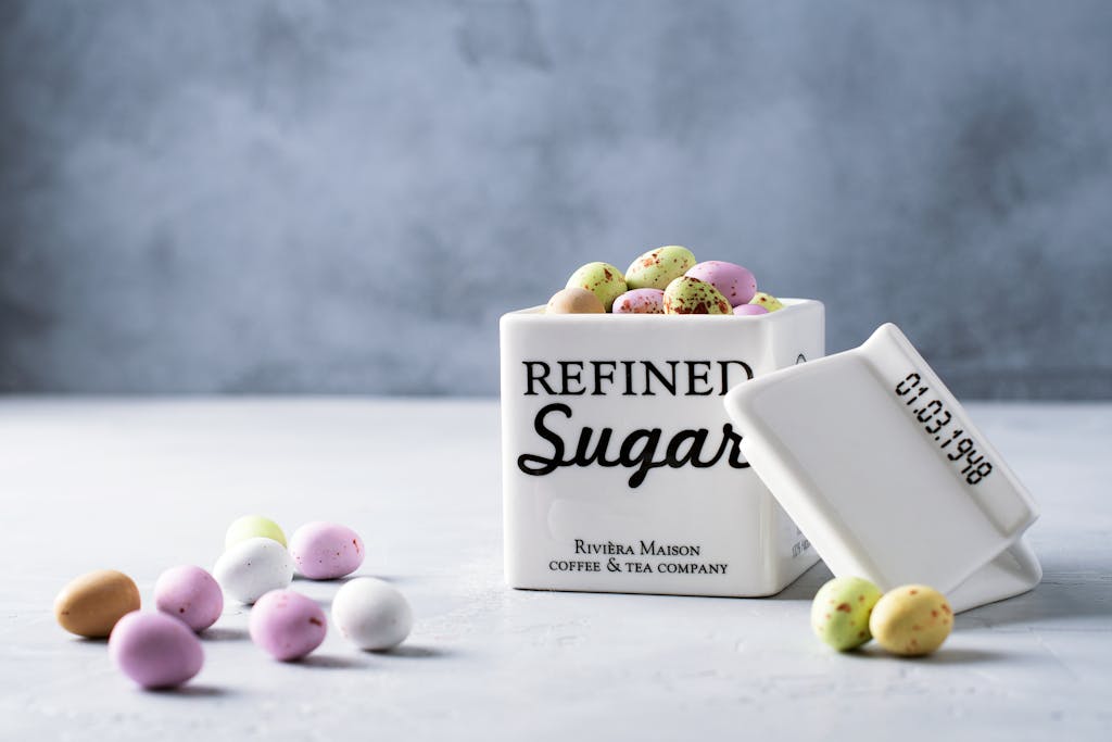 Easter-themed candies in a refined sugar jar, perfect for festive decor.