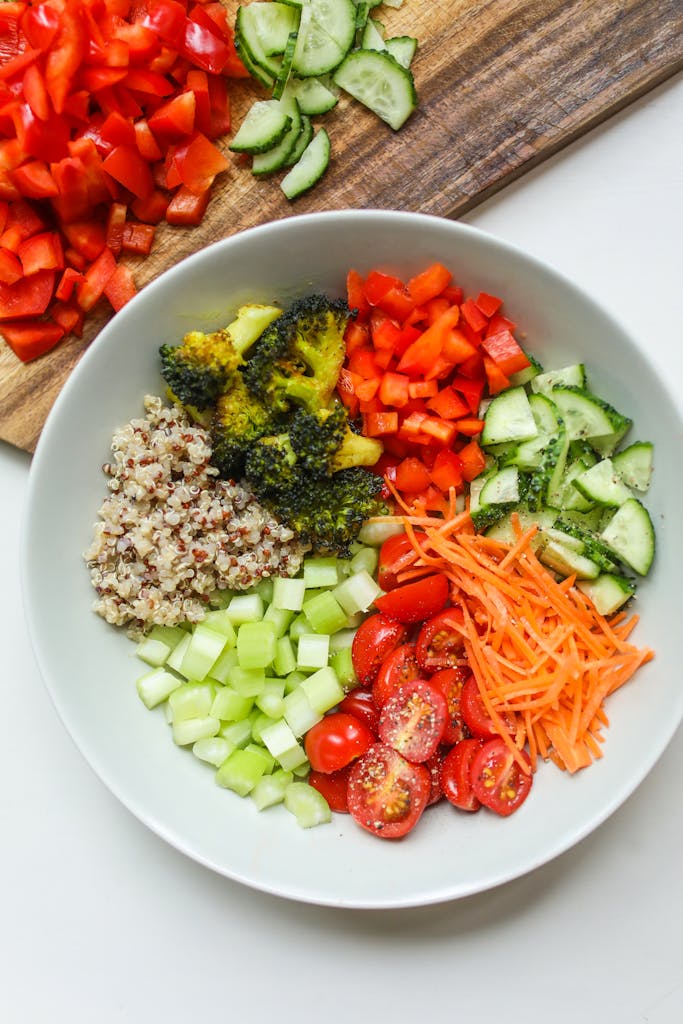 A vibrant bowl of fresh vegetables and quinoa, perfect for a healthy meal in detox myths and facts