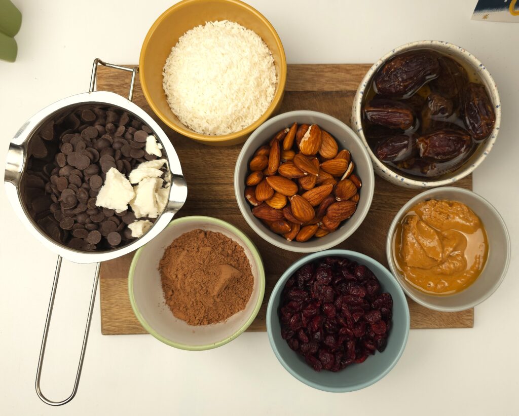 almond cranberry chocolate bars ingredients in bowls