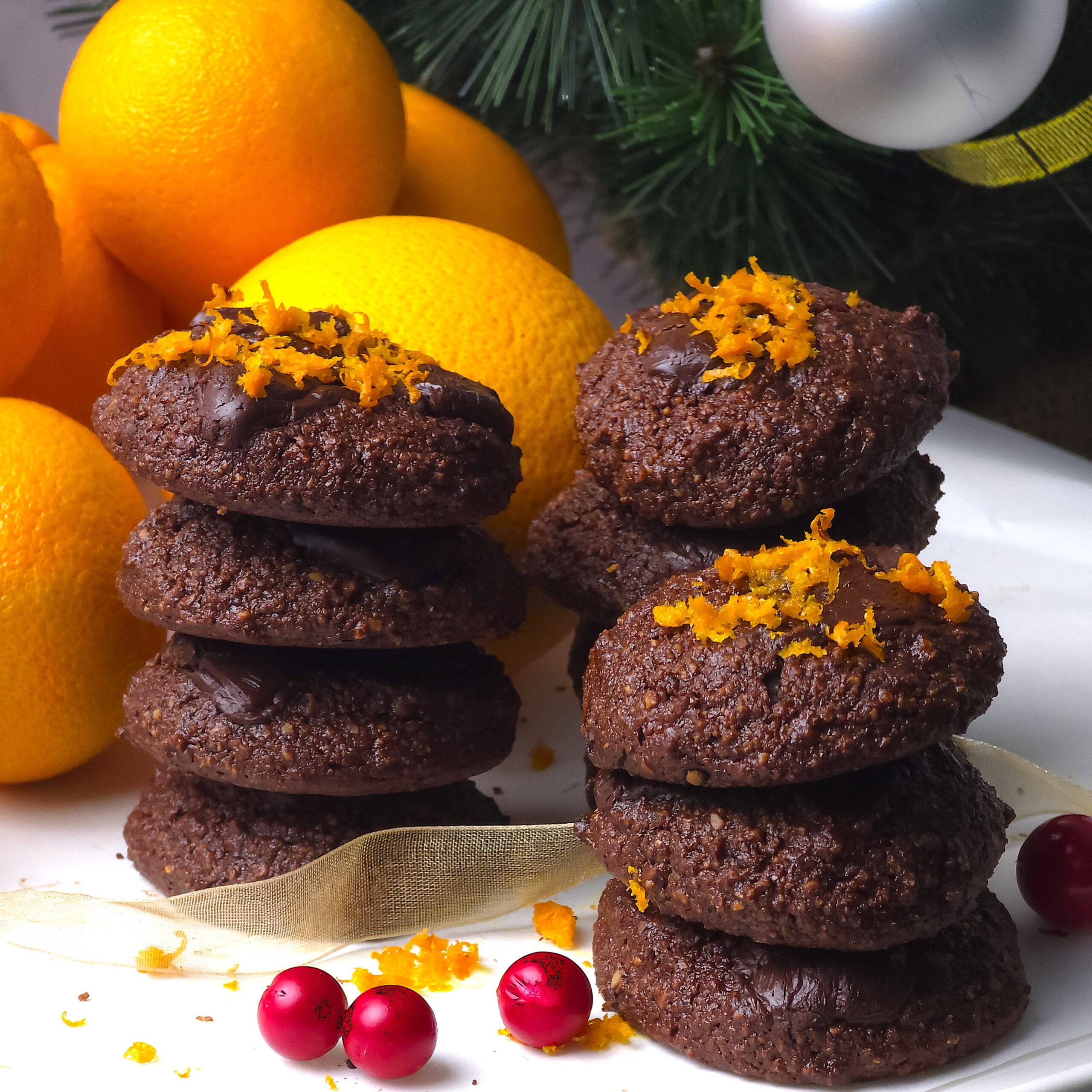 Chocolate orange cookies topped with orange zest.