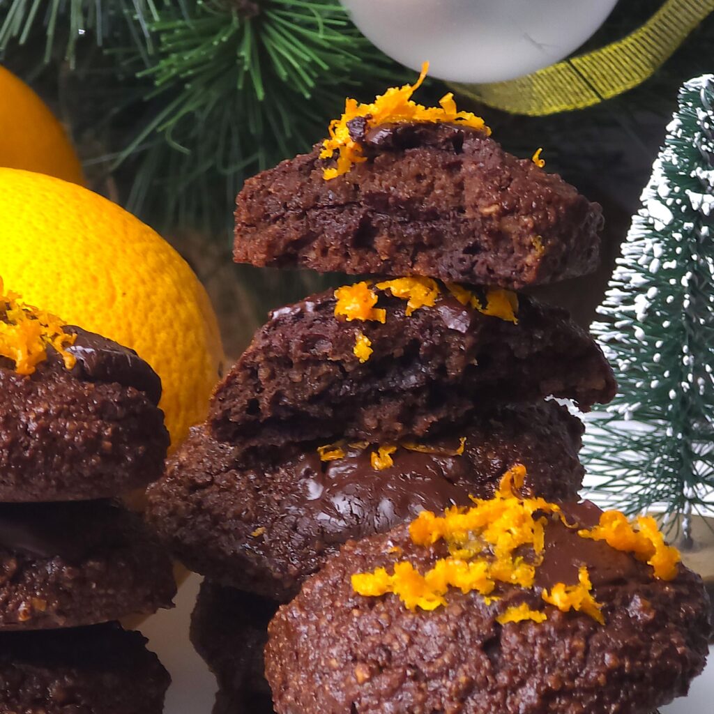 Gluten-free chocolate orange cookies topped with orange zest