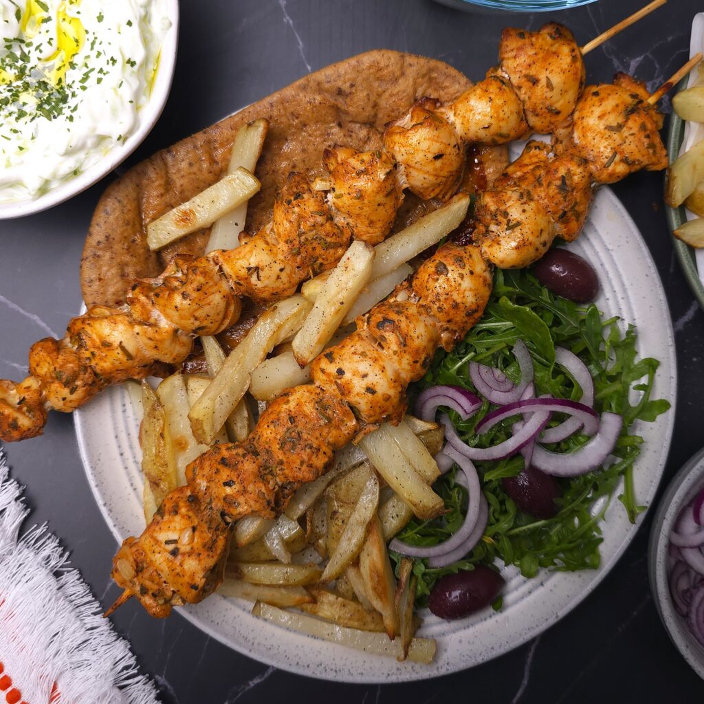 Grilled greek chicken souvlaki with sides