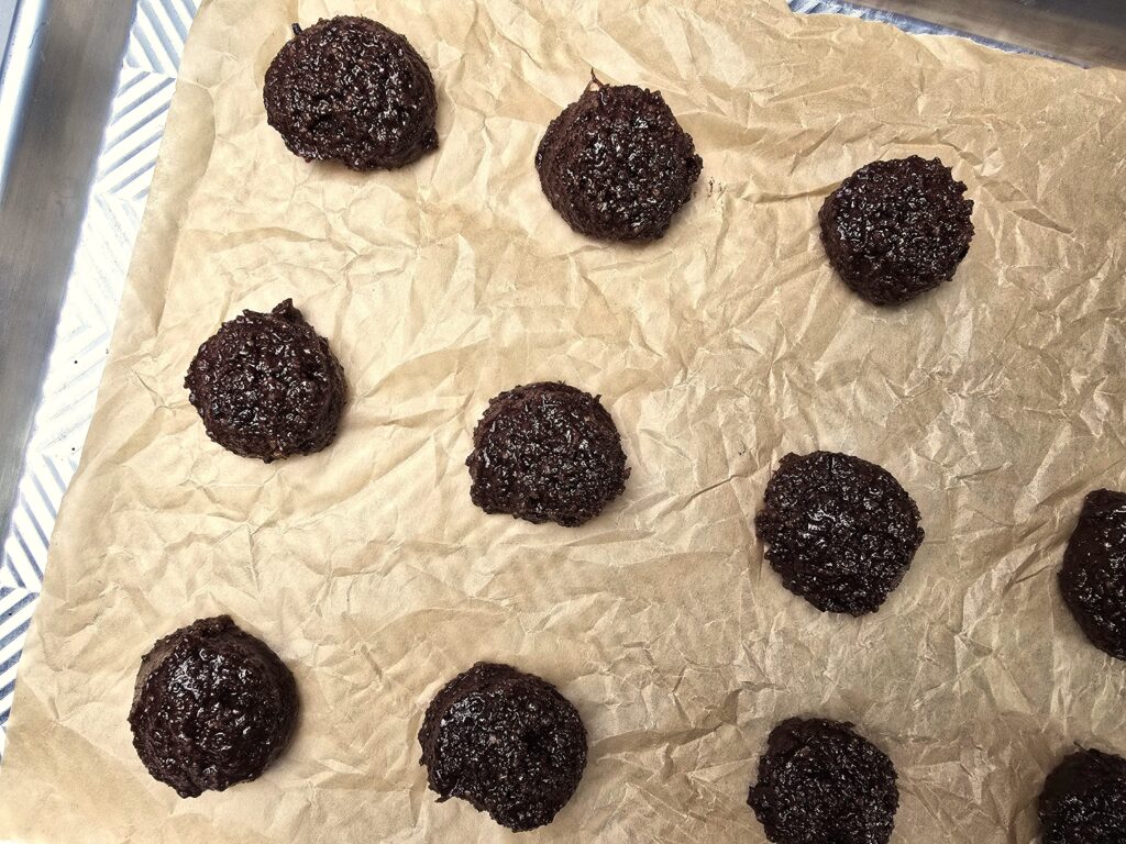 Chocolate cookie dough on parchment paper