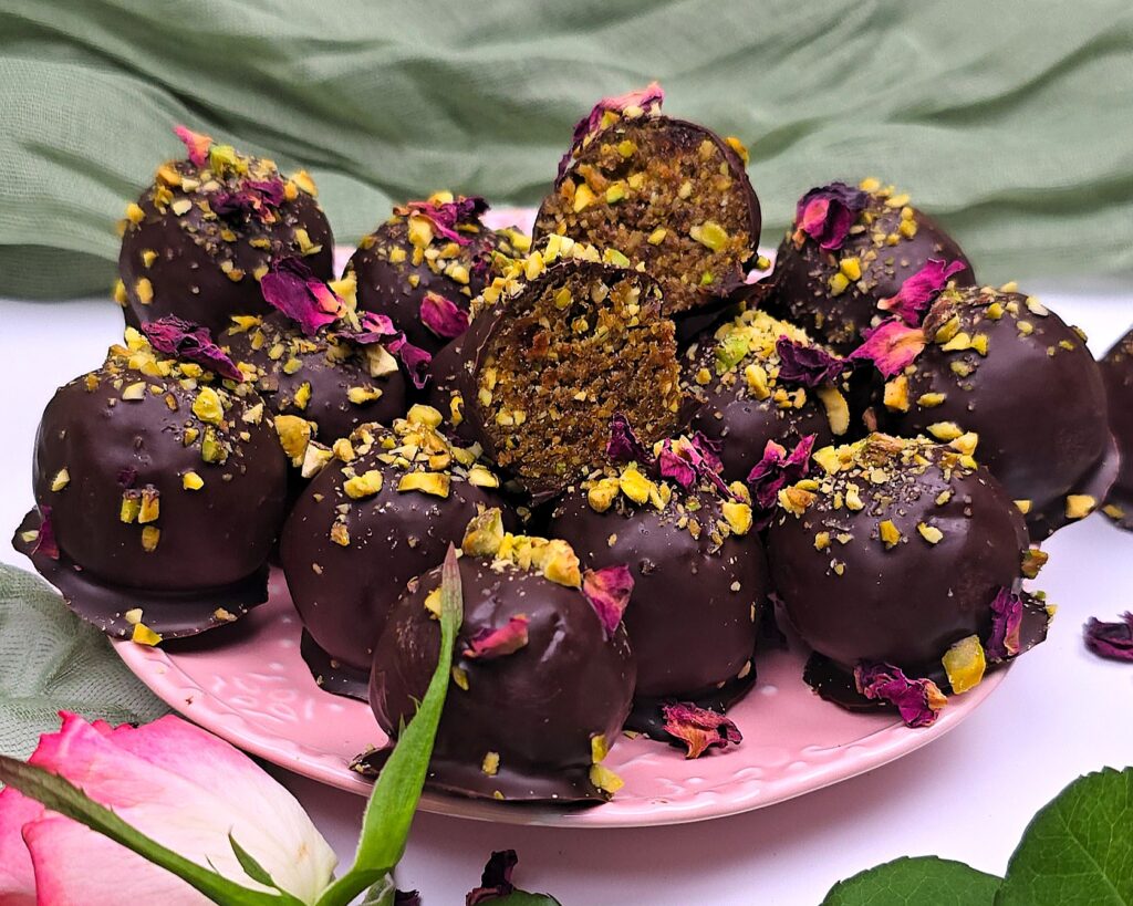no-bake pistachio walnut energy balls in a dessert plate